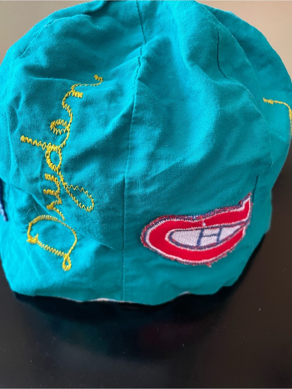 Teal Handmade Cap with Red Logo Patch and Yellow Embroidery